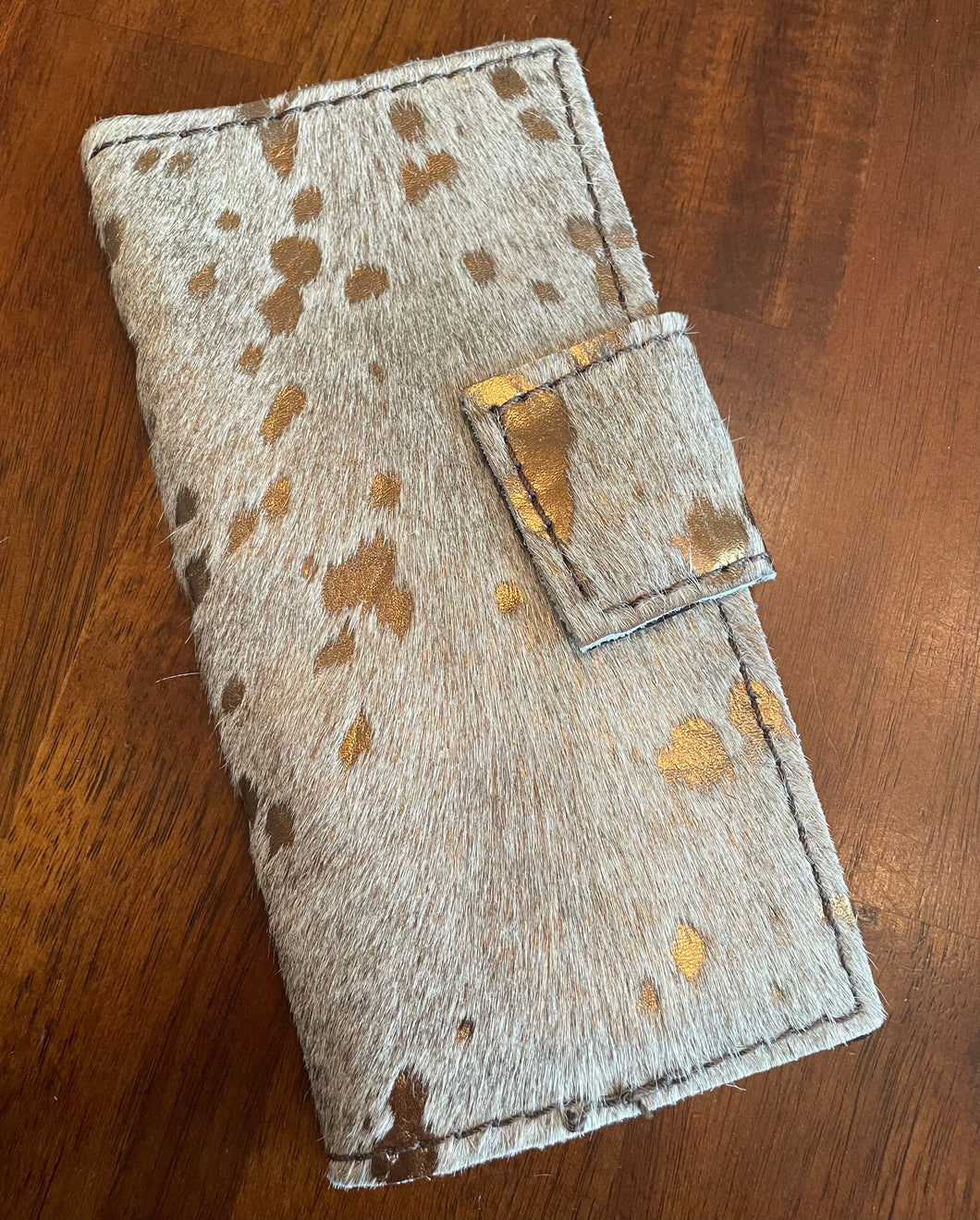 Hair on hide and leather wallet with gold